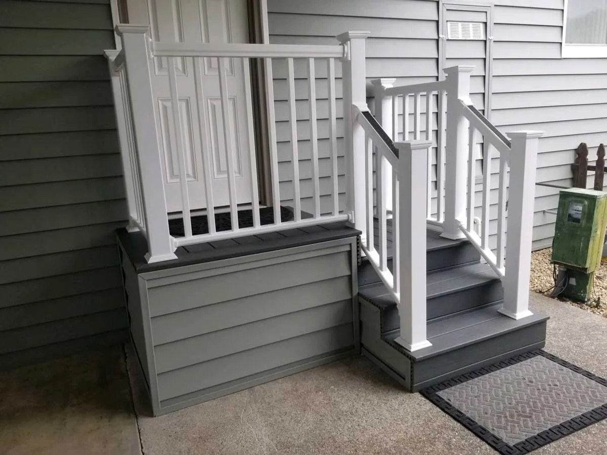 New mobile home entry stairs with landing and railings